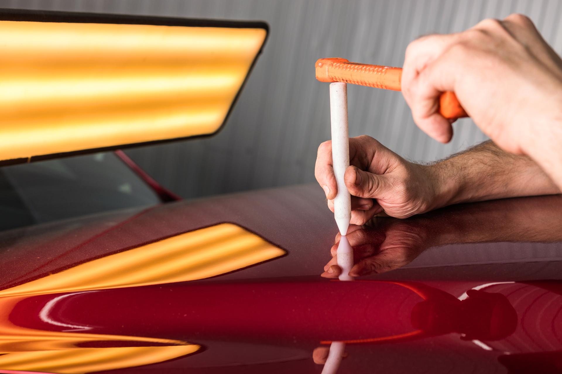 Paintless dent removal mastery